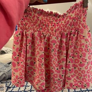Pink flower skirt has shorts under it